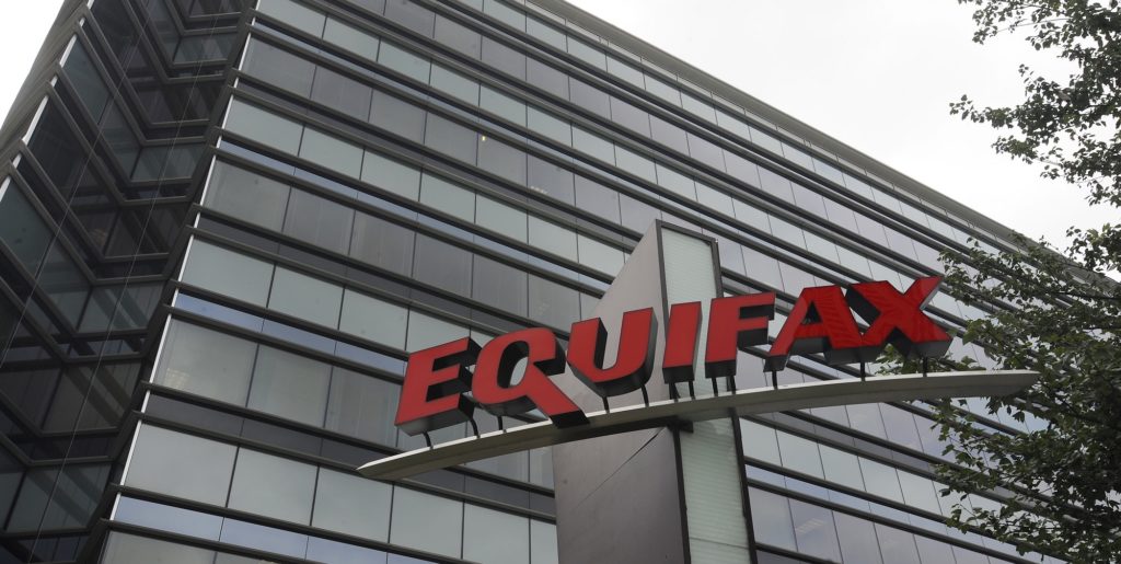 FILE - This July 21, 2012, file photo shows Equifax Inc., offices in Atlanta. On Monday, Sept. 11, 2017, Equifax said it has made changes to address customer complaints since it disclosed a week earlier that it exposed vital data on about 143 million Americans. Equifax has come under fire from members of Congress, state attorneys general, and people who are getting conflicting answers about whether their information was stolen. Equifax is trying again to clarify language about people’s right to sue, and said Monday it has made changes to address customer complaints. (AP Photo/Mike Stewart, File)