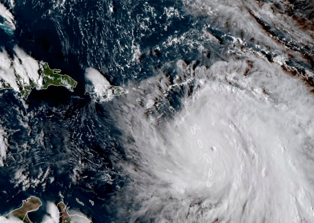 This Monday, Sept. 18, 2017, GOES East satellite image provided by NASA taken at 20:30 UTC, shows the eye of Hurricane Maria as it nears Dominica. The National Hurricane Center in Miami said Monday evening that Air Force Reserve hurricane hunter planes found that Maria had strengthened into a storm with 160 mph (260 kph) winds. (NASA via AP)