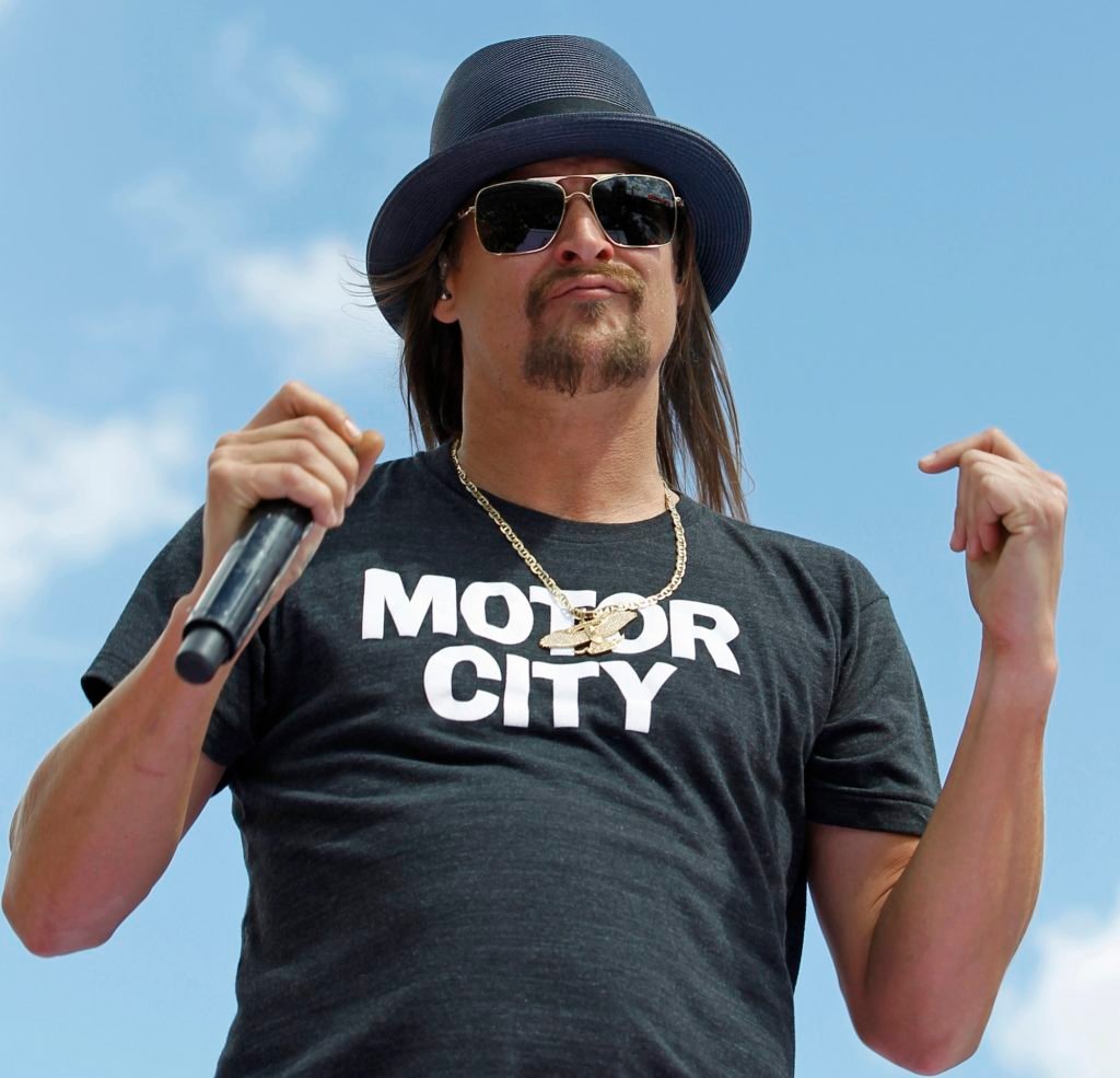 FILE - In this Feb. 22, 2015 file photo, Kid Rock performs before the Daytona 500 NASCAR Sprint Cup series auto race at Daytona International Speedway in Daytona Beach, Fla. A civil rights organization said Wednesday, Sept. 6, 2017, they are demanding the cancellation of concerts by Kid Rock at a new sports arena in Detroit, saying his criticism of NFL quarterback Colin Kaepernick was a "dog whistle" to white supremacist groups. (AP Photo/Terry Renna, File)