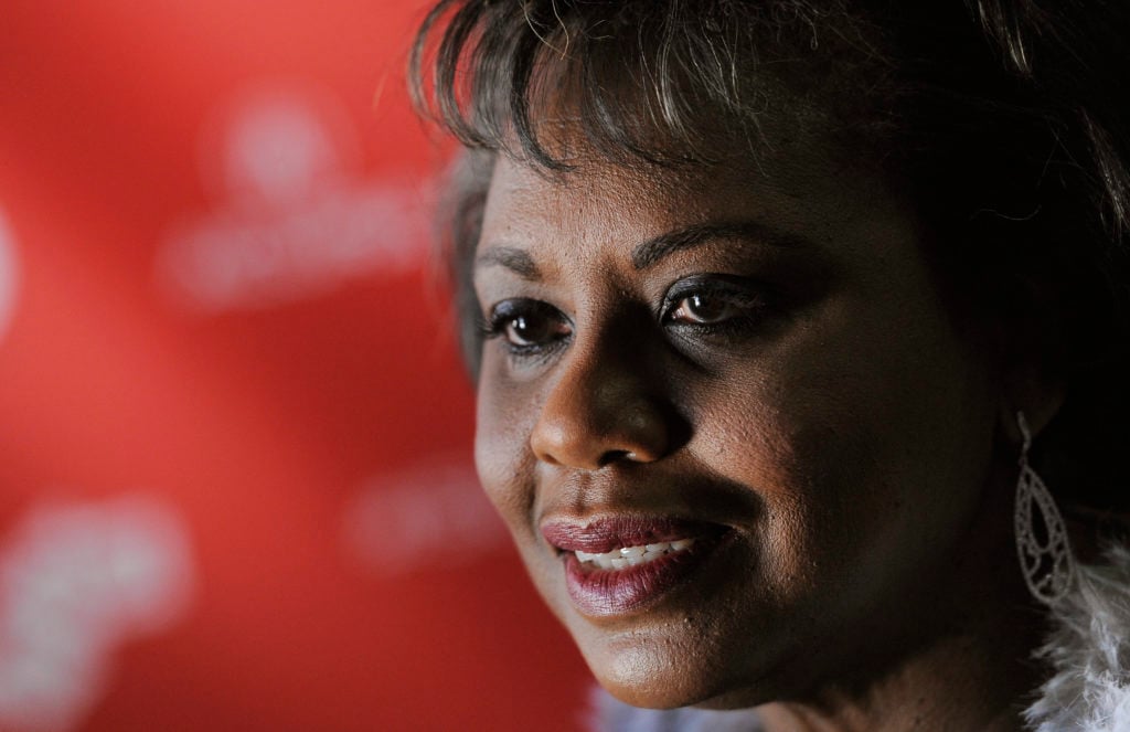 FILE- In Jan. 19, 2013 file photo, Anita Hill, subject of the documentary film "ANITA," poses at the premiere of the film at the 2013 Sundance Film Festival, in Park City, Utah. From the Clarence Thomas hearings to the Harvey Weinstein scandal: Some 26 years after her testimony brought sexual harassment into the national spotlight, Hill says she sees the needle moving yet again with the saga that is transfixing Hollywood. Yet Hill also cautions that real-world progress will be incremental at best, and many women in the workplace still fear retaliation if they come forward. Others cite confidential settlements as a hindrance to progress. (Photo by Chris Pizzello/Invision/AP, File)