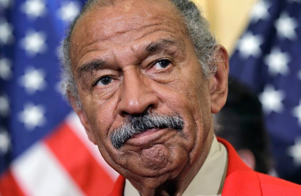 Rep. John Conyers, D-Mich., the ranking member of the House Judiciary Committee, listens during a news conference on Capitol Hill in Washington, Monday, April 4, 2011, to discuss efforts to thwart the harm done to the economy by online vendors dealing in counterfeit goods or copyright infringement. (AP Photo/J. Scott Applewhite)