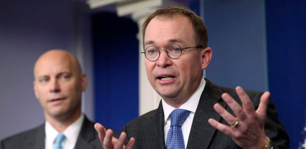Director of the Office of Management and Budget Mick Mulvaney, right, and Marc Short, left, White House director for legislative affairs, speak to members of the media in the Brady Press Briefing Room of the White House, Friday, Jan. 19, 2018, about a potential government shutdown this weekend. (AP Photo/Pablo Martinez Monsivais)