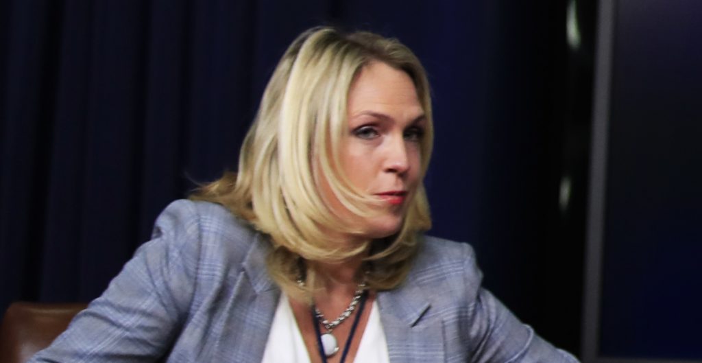 In this March 22, 2018 photo, special assistant to President Donald Trump, Kelly Sadler attends a forum at the Eisenhower Executive Office Building on the White House complex in Washington. The White House is refusing to condemn a staffer who said during a closed-door meeting that Arizona Sen. John McCain's opinion "doesn't matter" because "he's dying anyway." (AP Photo/Manuel Balce Ceneta)
