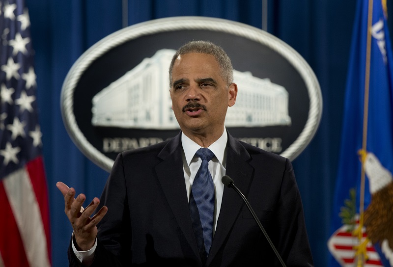 FILE - In this March 4, 2015 file photo, Attorney General Eric Holder speaks at the Justice Department in Washington. Holder is bidding farewell to the Justice Department after six years as the nations top law enforcement official. Holder is scheduled to address Justice Department employees at a ceremony on Friday. (AP Photo/Carolyn Kaster, File)