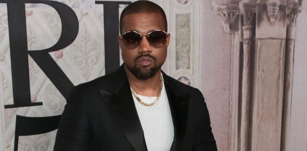 FILE- In this Sept. 7, 2018, file photo Kanye West attends the Ralph Lauren 50th Anniversary Event held at Bethesda Terrace in Central Park during New York Fashion Week in New York. President Donald Trump has panned Saturday Night Live's season premiere but tweeted praise for Kanye West. As the show ended, West took the stage wearing a "Make America Great Again" hat and made an unscripted pro-Trump speech after the credits rolled. (Photo by Brent N. Clarke/Invision/AP, File)