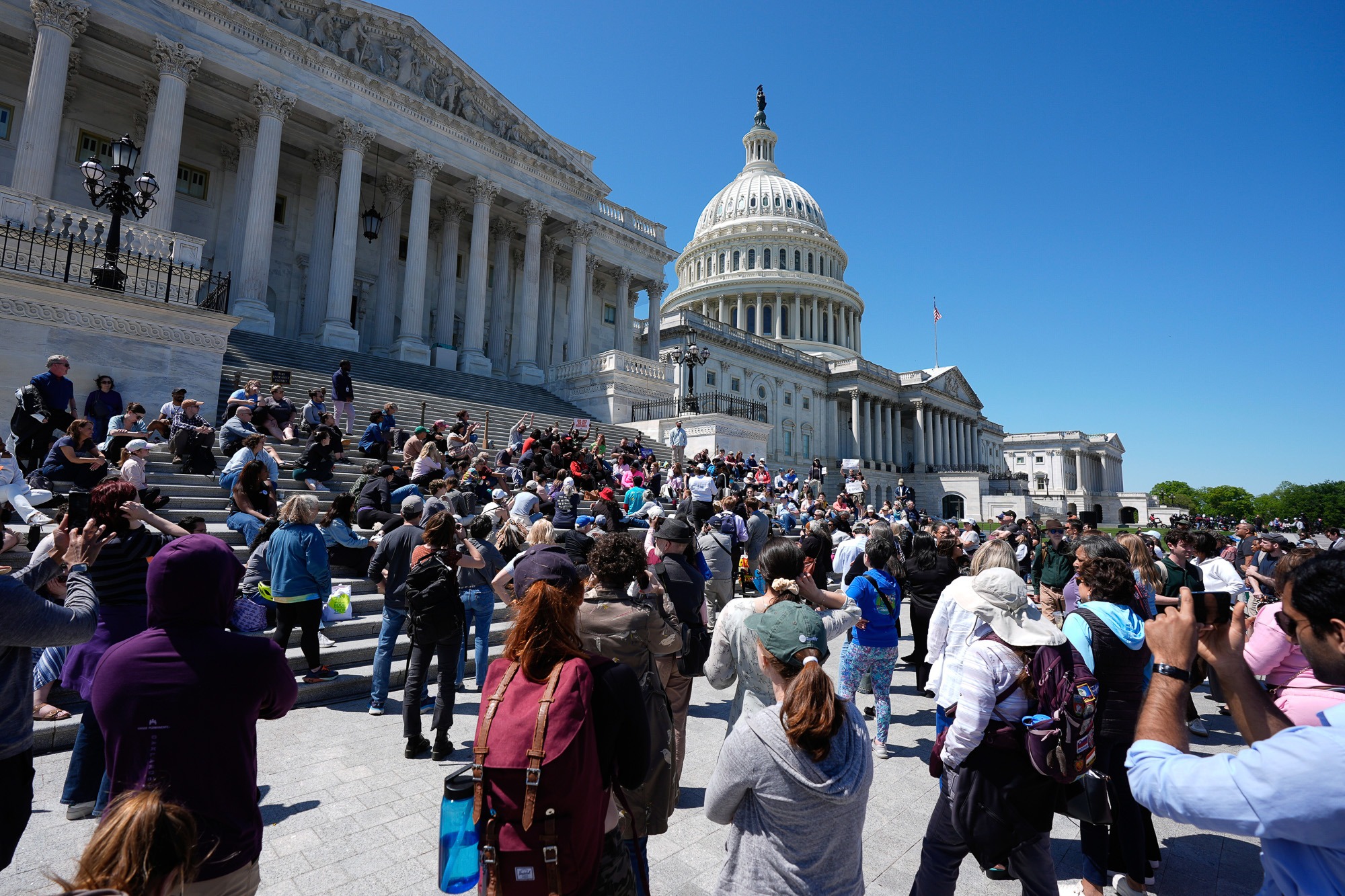 Crowd gathers on the steps of the U.S. Capitol as economic concerns mount and state treasurers call on Congress to act on trade and fiscal policy.