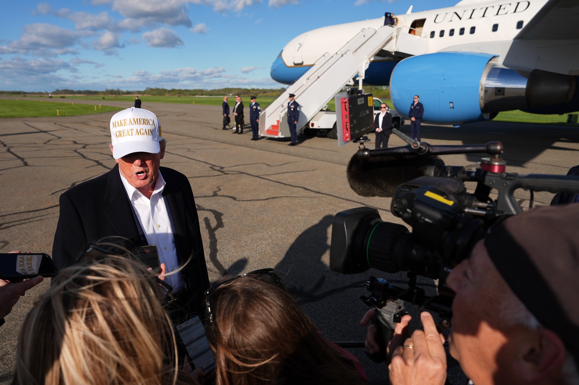 Donald Trump speaks with reporters on the tarmac at Morristown Municipal Airport after returning from the Vatican, addressing Ukraine, Crimea, and calls for peace with Russia
