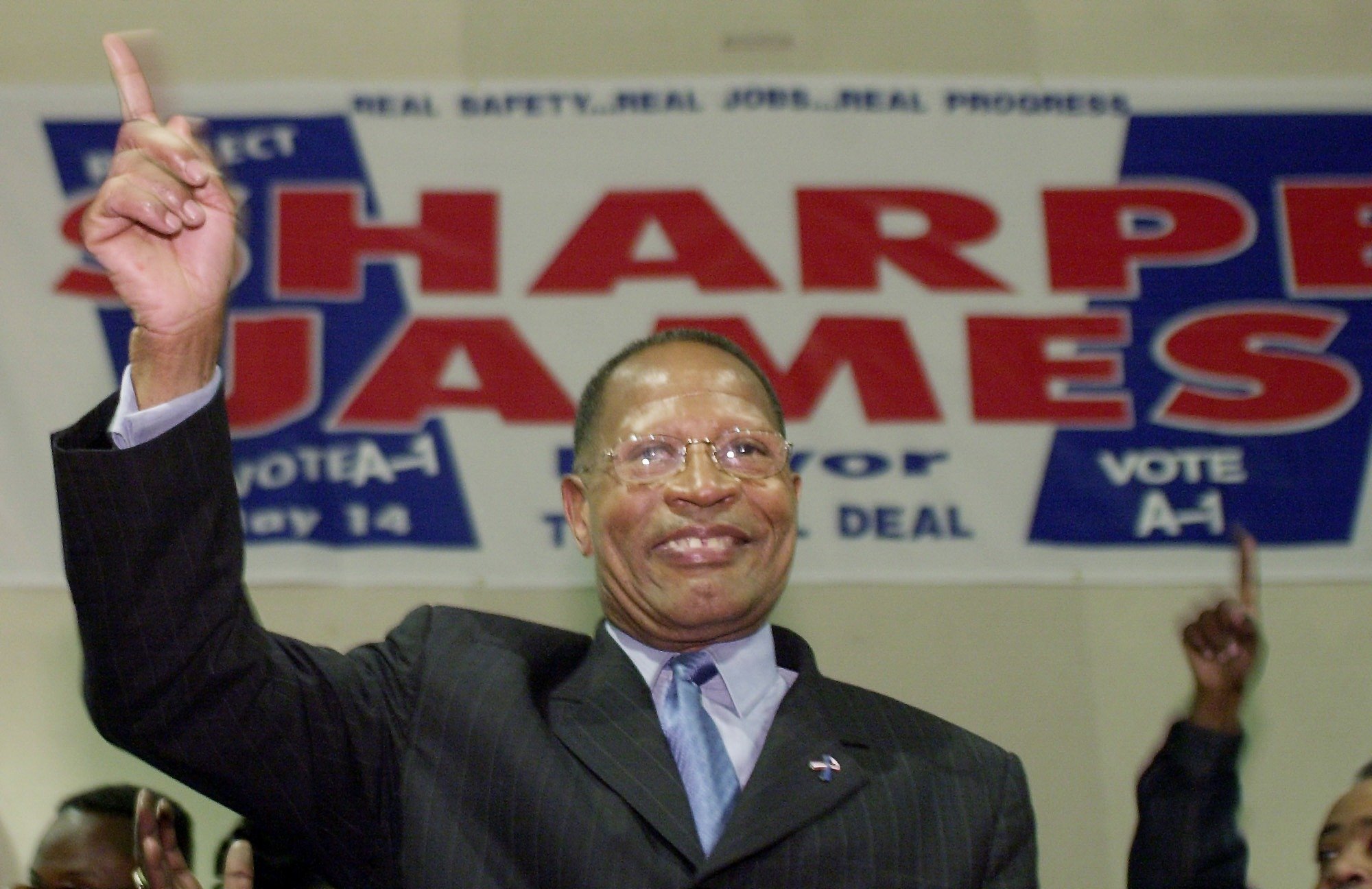 Newark Mayor Sharpe James celebrates at his election night headquarters after an electoral victory
