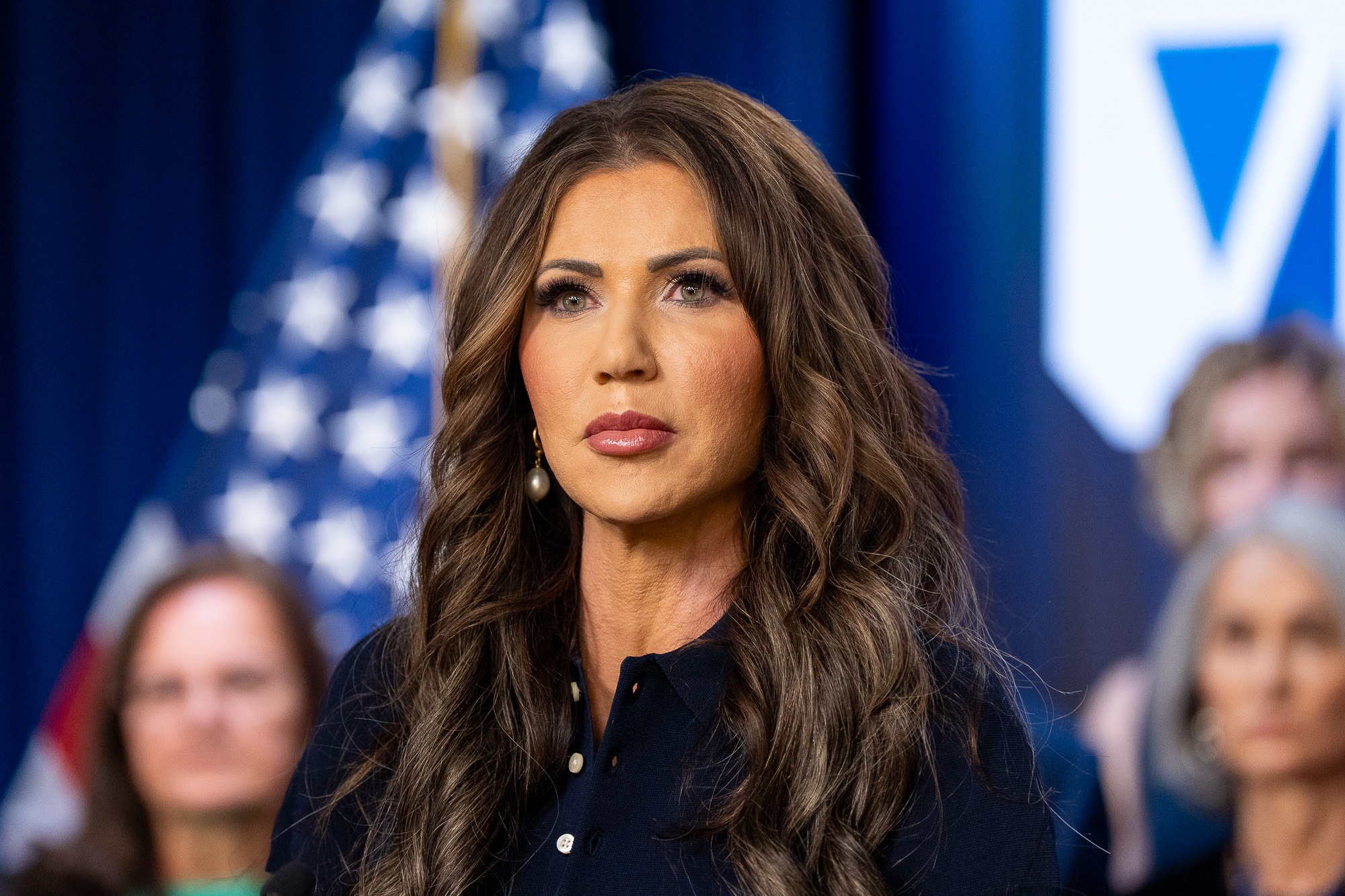 Kristi Noem speaks at a news conference.