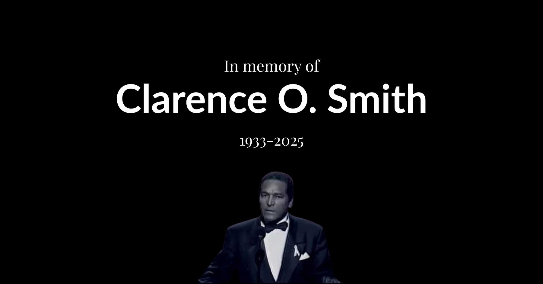 In memory of Clarence O. Smith, Essence co-founder and marketing trailblazer, shown in formal attire during a public appearance celebrating Black excellence.