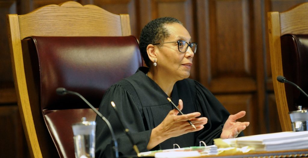 Sheila Abdus-Salaam, Associate Judge of the Court of Appeals, listens to oral arguments on whether criminal defendants should be allowed to use allegations made in civil rights lawsuits against police witnesses to question their credibility during cross-examination at the Court of Appeals on Wednesday, June 1, 2016, in Albany, N.Y. (AP Photo/Hans Pennink)