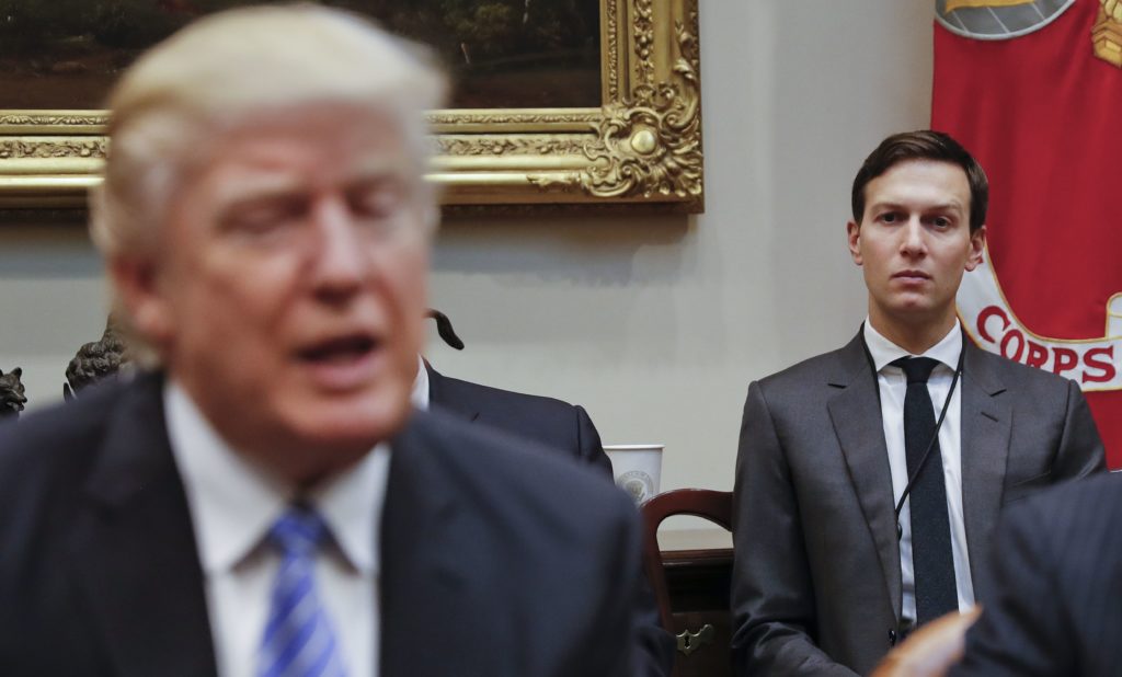 White House Senior Adviser Jared Kushner listens at right as President Donald Trump speaks during a breakfast with business leaders in the Roosevelt Room of the White House in Washington, Monday, Jan. 23, 2017. (AP Photo/Pablo Martinez Monsivais)