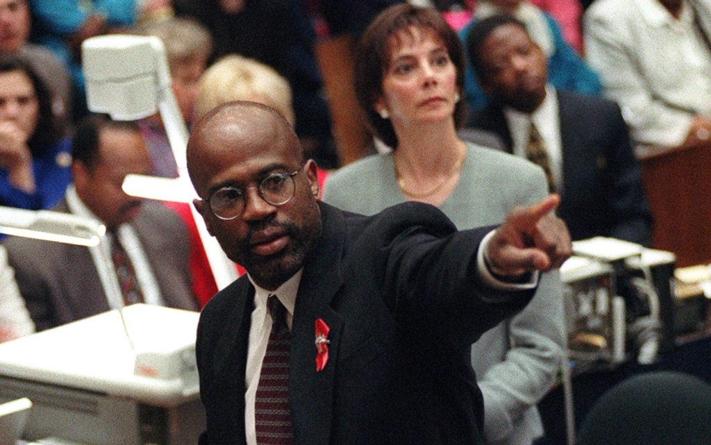 Prosecutor Christopher Darden points at a chart during his closing arguments as Marcia Clark looks on, Friday, Sept. 29, 1995, in a Los Angeles courtroom during the O.J. Simpson double-murder trial. (AP Photo/Reed Saxon, pool)