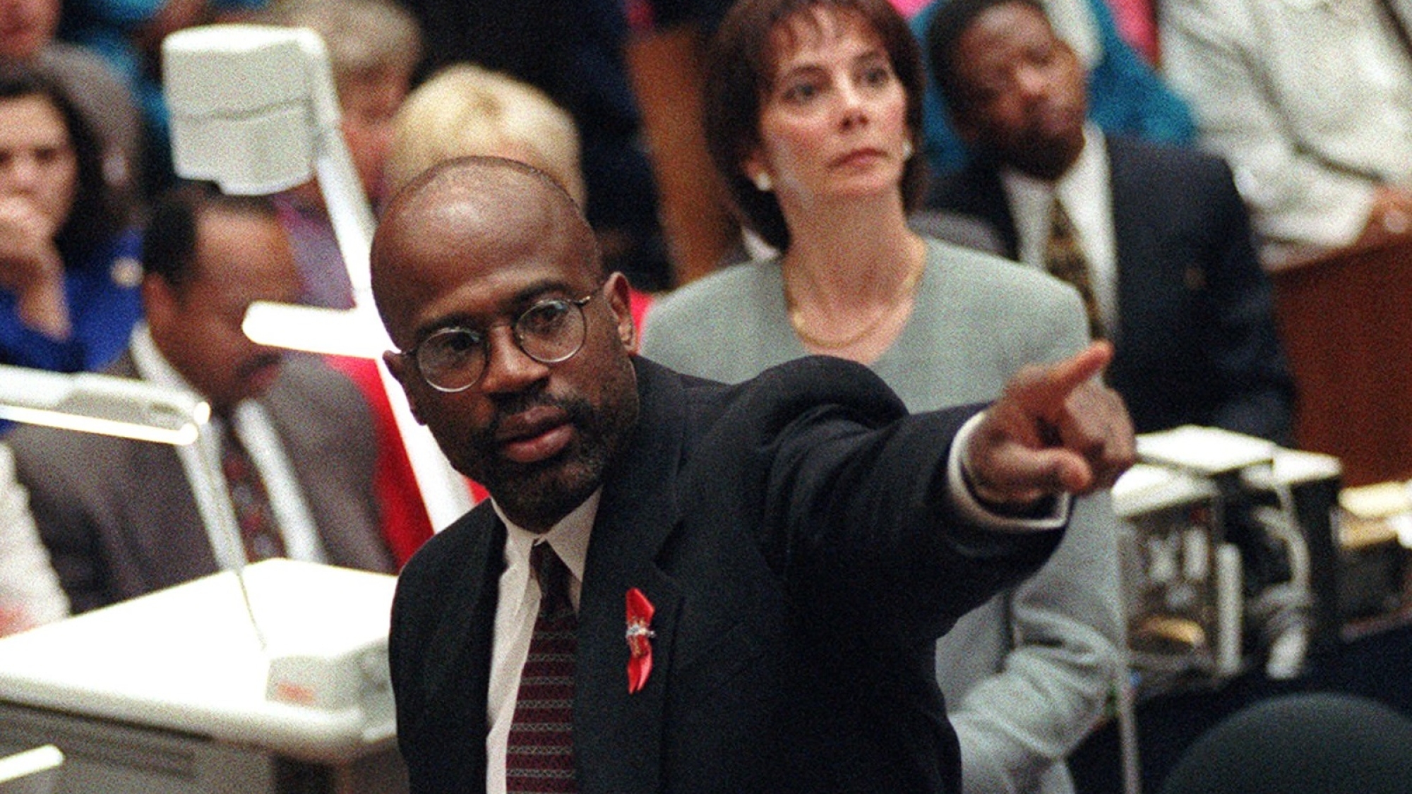 Prosecutor Christopher Darden points at a chart during his closing arguments as Marcia Clark looks on, Friday, Sept. 29, 1995, in a Los Angeles courtroom during the O.J. Simpson double-murder trial.  (AP Photo/Reed Saxon, pool)