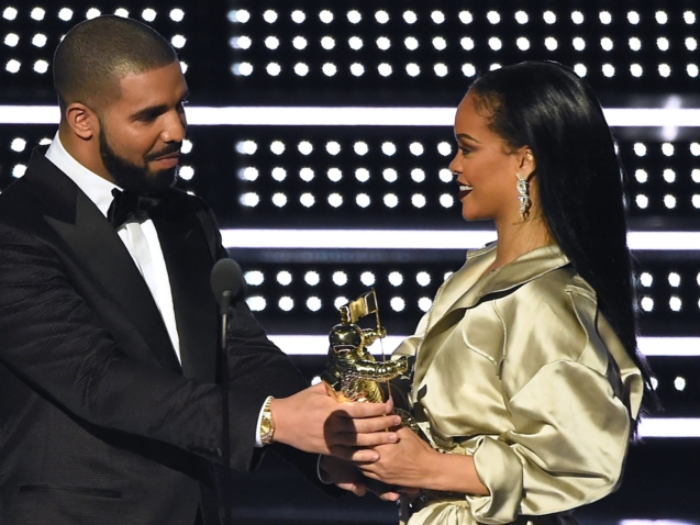 FILE - In this Aug. 28, 2016, file photo, Drake, left, presents the Michael Jackson Video Vanguard Award to Rihanna at the MTV Video Music Awards at Madison Square Garden in New York. Rihanna thanked Drake on Instagram Friday, Sept. 2, 2016, for his presentation, calling the rapper's speech "touching." (Photo by Charles Sykes/Invision/AP, File)