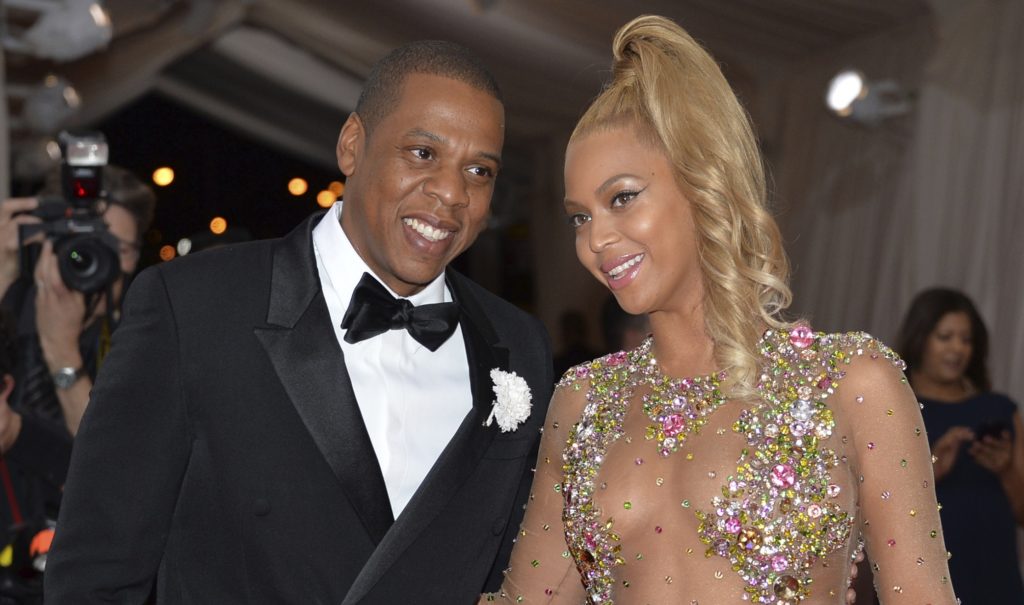 File - In this May 4, 2015, file photo, Jay Z, left, and Beyonce arrive at The Metropolitan Museum of Art's Costume Institute benefit gala celebrating "China: Through the Looking Glass" in New York. Country music power couple Faith Hill and Tim McGraw talk about what they admire about other musical couples, from Beyonce and Jay Z to Garth Brooks and Trisha Yearwood. “The truth is, I want to be Beyonce every single freaking night of my life,” Hill said.  (Photo by Evan Agostini/Invision/AP, File)