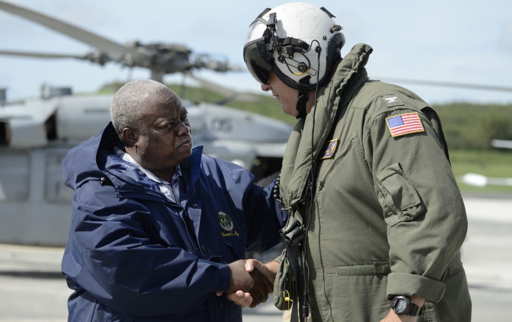 U.S. Virgin Islands governor Kenneth Mapp arrives at the Charles F. Blair National Guard Hangar after flying over St. Thomas, one of the Islands hit by Hurricane Irma 48 hours ago, in St. Croix, Friday, September 8, 2017. Irma is one of the most powerful storms ever recorded in the Atlantic. (AP Photo/Carlos Giusti)