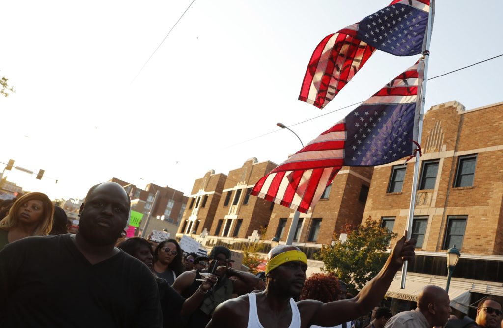 Demonstrators march in response to a not guilty verdict in the trial of former St. Louis police officer Jason Stockley Saturday, Sept. 16, 2017, in St. Louis. Stockley was acquitted in the 2011 killing of a black man following a high-speed chase. (AP Photo/Jeff Roberson)