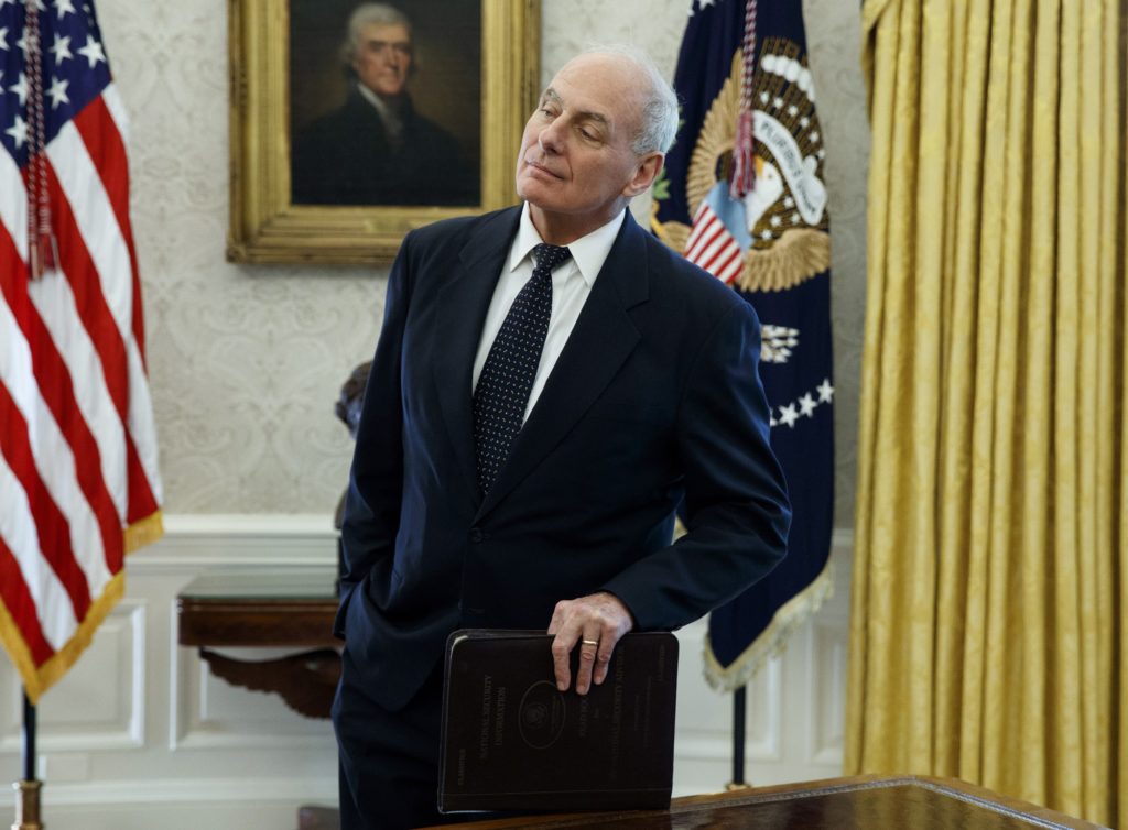 White House Chief of Staff John Kelly listens as President Donald Trump meets with Governor Ricardo Rossello of Puerto Rico in the Oval Office of the White House, Thursday, Oct. 19, 2017, in Washington. (AP Photo/Evan Vucci)