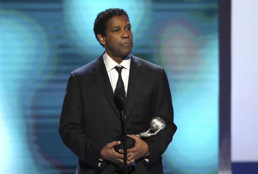 Denzel Washington accepts the award for outstanding actor in a motion picture for "Fences" at the 48th annual NAACP Image Awards at the Pasadena Civic Auditorium on Saturday, Feb. 11, 2017, in Pasadena, Calif. (Photo by Matt Sayles/Invision/AP)