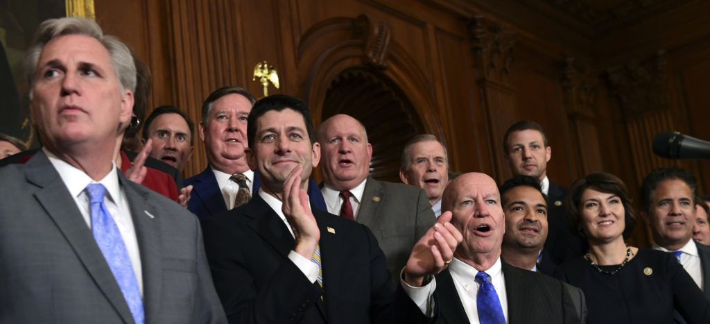 House Republicans, including House Majority Leader Kevin McCarthy of Calif., left, House Speaker Paul Ryan of Wis., fourth from right, and House Ways and Means Committee Chairman Rep. Kevin Brady, R-Texas, fifth from right, wait to start a news conference following a vote on tax reform on Capitol Hill in Washington, Thursday, Nov. 16, 2017. Republicans passed a near $1.5 trillion package overhauling corporate and personal taxes through the House, edging President Donald Trump and the GOP toward their first big legislative triumph in a year in which they and their voters expected much more. (AP Photo/Susan Walsh)