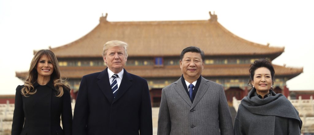 President Donald Trump, second left, first lady Melania Trump, left,  Chinese President Xi Jinping, second right, and his wife Peng Liyuan, right, stand together as they tour the Forbidden City, Wednesday, Nov. 8, 2017, in Beijing, China. Trump is on a five country trip through Asia traveling to Japan, South Korea, China, Vietnam and the Philippines. (AP Photo/Andrew Harnik)