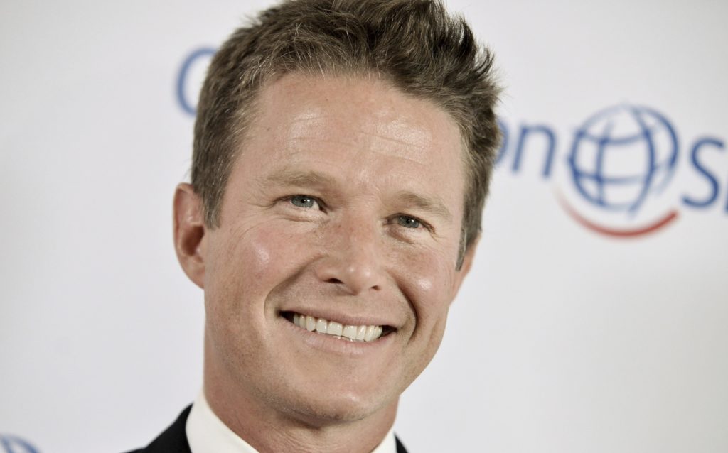 FILE - In this Sept. 19, 2014 file photo, Billy Bush arrives at the Operation Smile's 2014 Smile Gala in Beverly Hills, Calif. Bush, who was fired after an old video emerged of him engaging in offensive sex talk with then "Apprentice" host Donald Trump, said in an op-ed published in The New York Times on Sunday, Dec. 3, 2017, that it was indeed Trump’s voice captured on a 2005 "Access Hollywood" tape. (Photo by Richard Shotwell/Invision/AP, File)