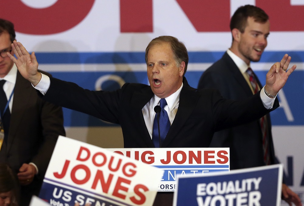 Democrat Doug Jones speaks Tuesday, Dec. 12, 2017, in Birmingham, Ala. In a stunning victory aided by scandal, Democrat Doug Jones won Alabama's special Senate election on Tuesday, beating back history, an embattled Republican opponent and President Donald Trump, who urgently endorsed GOP rebel Roy Moore despite a litany of sexual misconduct allegations. (AP Photo/John Bazemore)