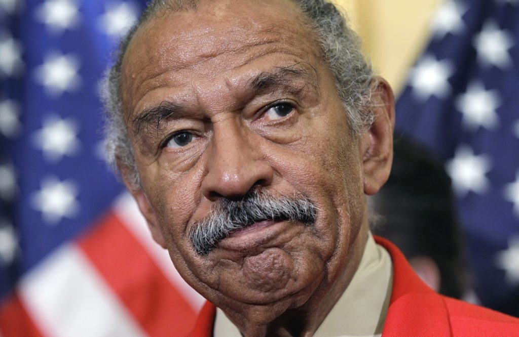 Rep. John Conyers, D-Mich., the ranking member of the House Judiciary Committee, listens during a news conference on Capitol Hill in Washington, Monday, April 4, 2011, to discuss efforts to thwart the harm done to the economy by online vendors dealing in counterfeit goods or copyright infringement.  (AP Photo/J. Scott Applewhite)