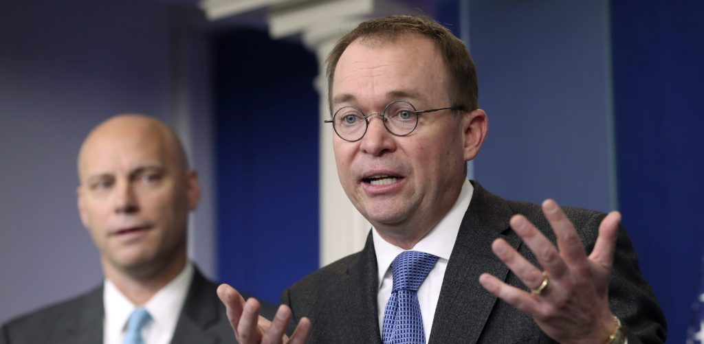 Director of the Office of Management and Budget Mick Mulvaney, right, and Marc Short, left, White House director for legislative affairs, speak to members of the media in the Brady Press Briefing Room of the White House, Friday, Jan. 19, 2018, about a potential government shutdown this weekend. (AP Photo/Pablo Martinez Monsivais)