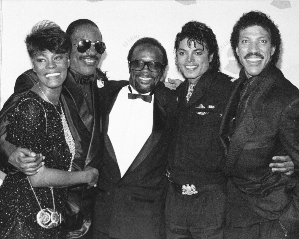 FILE - In this Feb. 26, 1986 file picture, Grammy winners Dionne Warwick, Stevie Wonder, Quincy Jones, Michael Jackson and Lionel Richie pose together backstage at the Grammy Awards show in Los Angeles. Jackson has died in Los Angeles at the age of 50 on Thursday, June 25, 2009. (AP Photo)