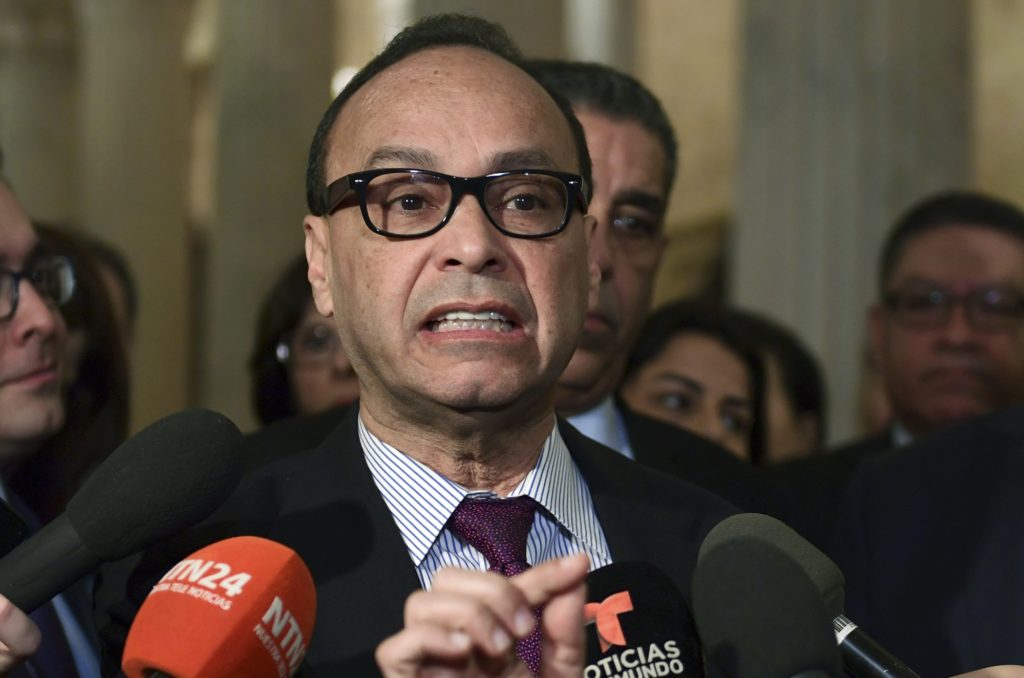 Rep. Luis Gutierrez, D-Ill., center, standing with Rep. Michelle Lujan Grisham, D-N.M., right, chairwoman of the Congressional Hispanic Caucus, and Rep. Pete Aguilar, D-Calif., second from right, speaks with reporters on Capitol Hill in Washington, Wednesday, Jan. 17, 2018, following a meeting with the Congressional Hispanic Caucus and White House Chief of Staff John Kelly. (AP Photo/Susan Walsh)