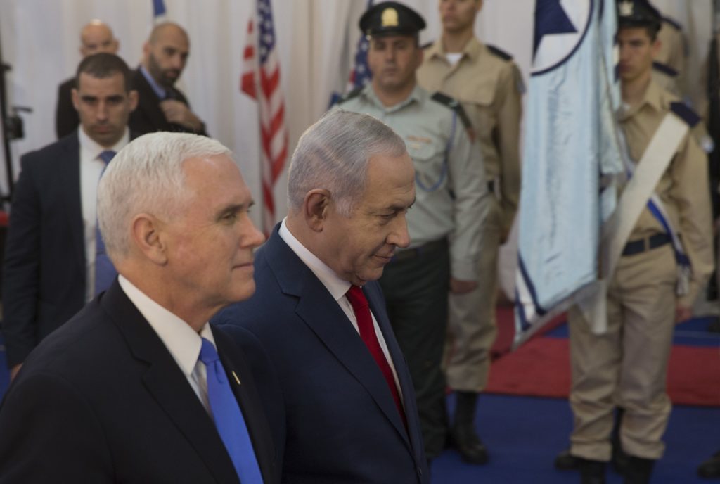 U.S. Vice President Mike Pence walks with Israel's Prime Minister Benjamin Netanyahu in Jerusalem, Monday, Jan. 22, 2018. Pence is receiving a warm welcome in Israel, which has praised the American decision last month to recognize Jerusalem as Israel’s capital. The decision has infuriated the Palestinians and upset America’s Arab allies as well.  (AP Photo/Ariel Schalit)