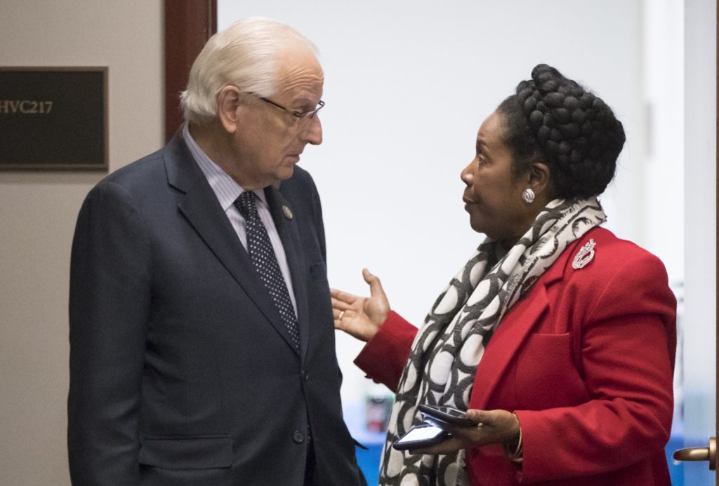 Rep. Bill Pascrell, D-N.J., left, confers with Rep. Sheila Jackson Lee, D-Texas, outside a closed-door meeting of the House Democratic Caucus as a bitterly-partisan Congress moves closer toward a government shutdown this weekend, on Capitol Hill in Washington, Friday, Jan. 19, 2018. (AP Photo/J. Scott Applewhite)