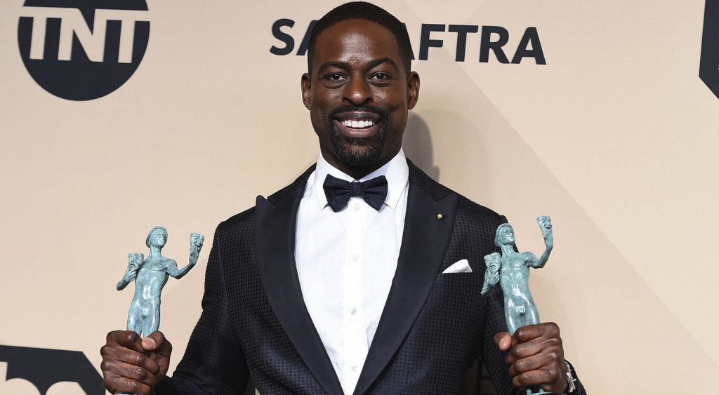 Sterling K. Brown, winner of the awards for outstanding performance by a male actor in a drama series for "This Is Us" and for outstanding performance by an ensemble in a drama series for "This Is Us", poses in the press room at the 24th annual Screen Actors Guild Awards at the Shrine Auditorium & Expo Hall on Sunday, Jan. 21, 2018, in Los Angeles. (Photo by Jordan Strauss/Invision/AP)