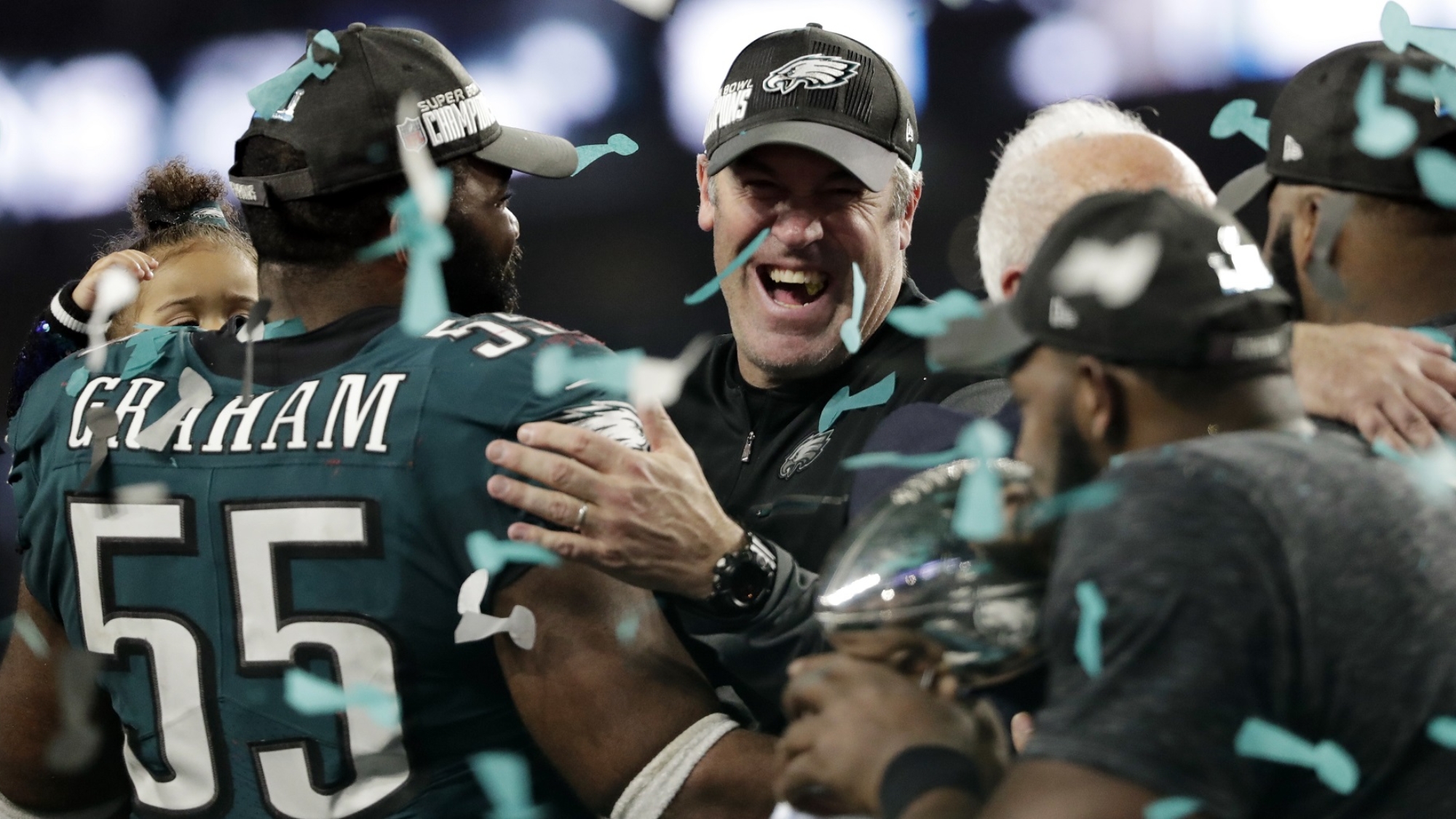 Philadelphia Eagles head coach Doug Pederson celebrates with defensive end Brandon Graham (55) and other players after winning the NFL Super Bowl 52 football game against the New England Patriots, Sunday, Feb. 4, 2018, in Minneapolis. The Eagles won 41-33. (AP Photo/Tony Gutierrez)