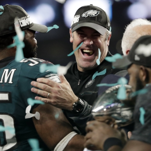 Philadelphia Eagles head coach Doug Pederson celebrates with defensive end Brandon Graham (55) and other players after winning the NFL Super Bowl 52 football game against the New England Patriots, Sunday, Feb. 4, 2018, in Minneapolis. The Eagles won 41-33. (AP Photo/Tony Gutierrez)