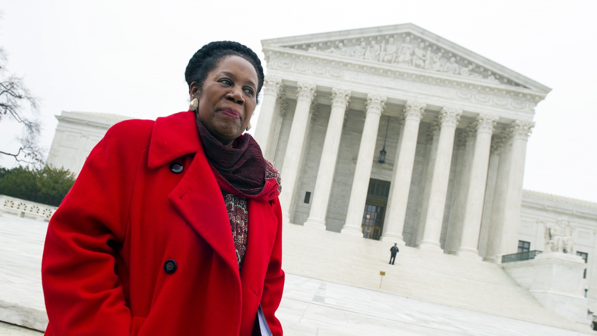 Rep. Sheila Jackson Lee, D-Texas waits to speak outside the Supreme Court in Washington, Wednesday, Dec. 9, 2015, after the court heard oral arguments in the Fisher v. University of Texas at Austin affirmative action case. (AP Photo/Cliff Owen)