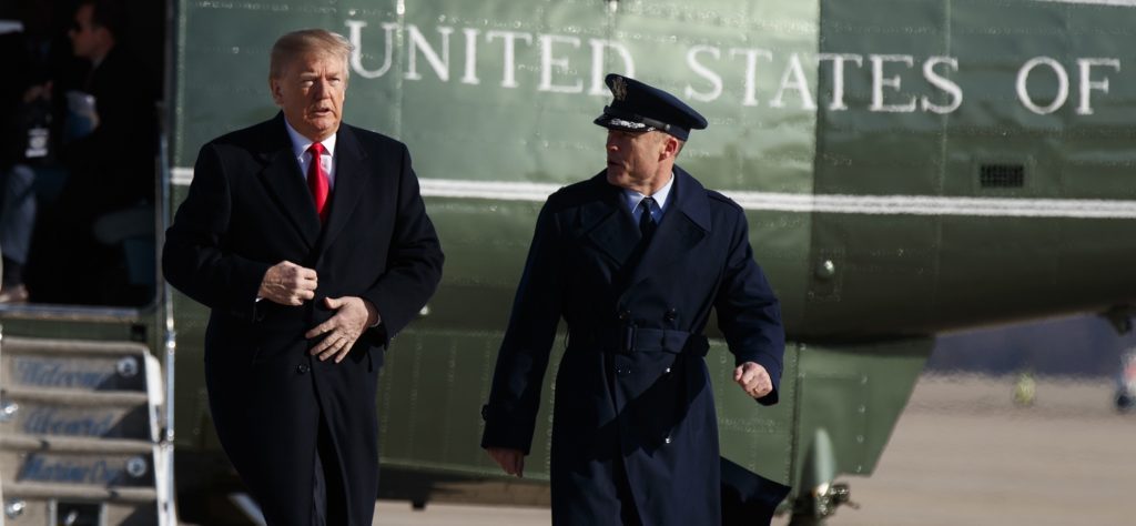 President Donald Trump boards Air Force One for a trip to California to view border wall prototypes, Tuesday, March 13, 2018, in Andrews Air Force Base, Md. Trump fired Secretary of State Rex Tillerson on Tuesday and said he would nominate CIA Director Mike Pompeo to replace him, in a major staff reshuffle just as Trump dives into high-stakes talks with North Korea. (AP Photo/Evan Vucci)