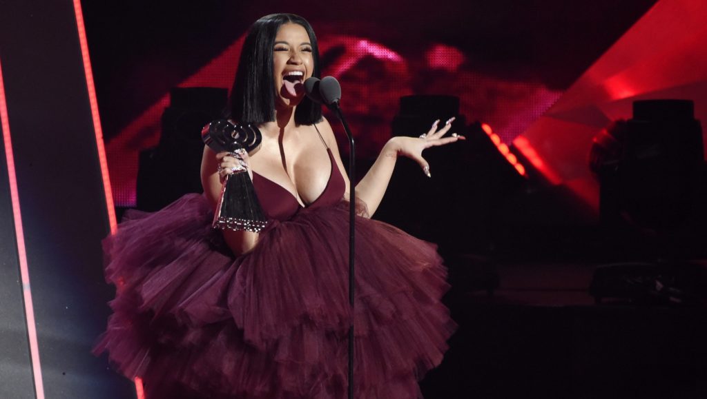 Singer Cardi B accepts the Best New Artist award during the 2018 iHeartRadio Music Awards at The Forum on Sunday, March 11, 2018, in Inglewood, Calif. (Photo by Chris Pizzello/Invision/AP)