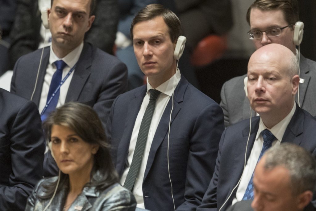 Jared Kushner, center, listens as Palestinian President Mahmoud Abbas speaks during a Security Council meeting on the situation in Palestine, Tuesday, Feb. 20, 2018 at United Nations headquarters. (AP Photo/Mary Altaffer)