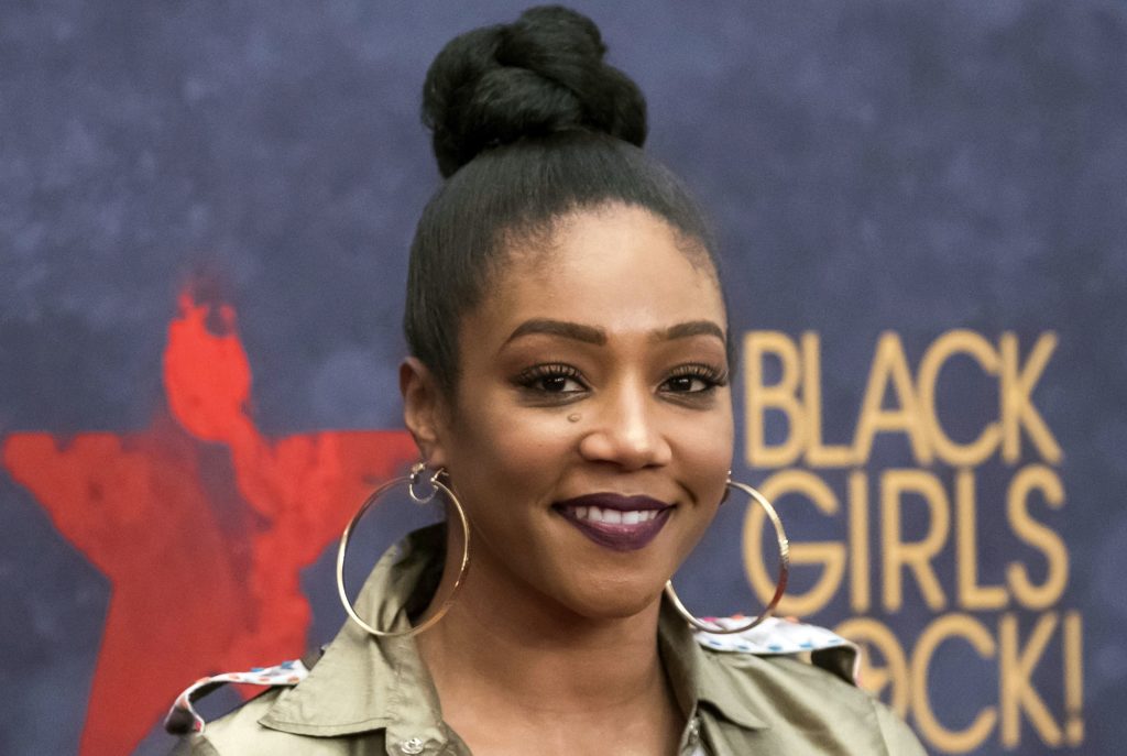 FILE - In this Aug. 5, 2017 file photo, Tiffany Haddish attends the Black Girls Rock! Awards at the New Jersey Performing Arts Center in Newark, N.J. Haddish is set to host the 2018 MTV Movie & TV Awards. The network announced Thursday, Feb. 22, 2018, that the “Girls Trip” breakout star will host the ceremony in Los Angeles on June 18. (Photo by Charles Sykes/Invision/AP, File)