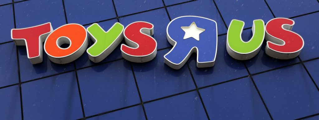 This is the Toys R Us logo on a store in Pittsburgh, Wednesday, Jan. 24, 2018. This store is one of the approximately 182 stores nationwide that Toys R Us plans to close as part of its Chapter 11 bankruptcy reorganization plan. Going-out-of-business sales are scheduled to begin in February and be completed in April. (AP Photo/Gene J. Puskar)