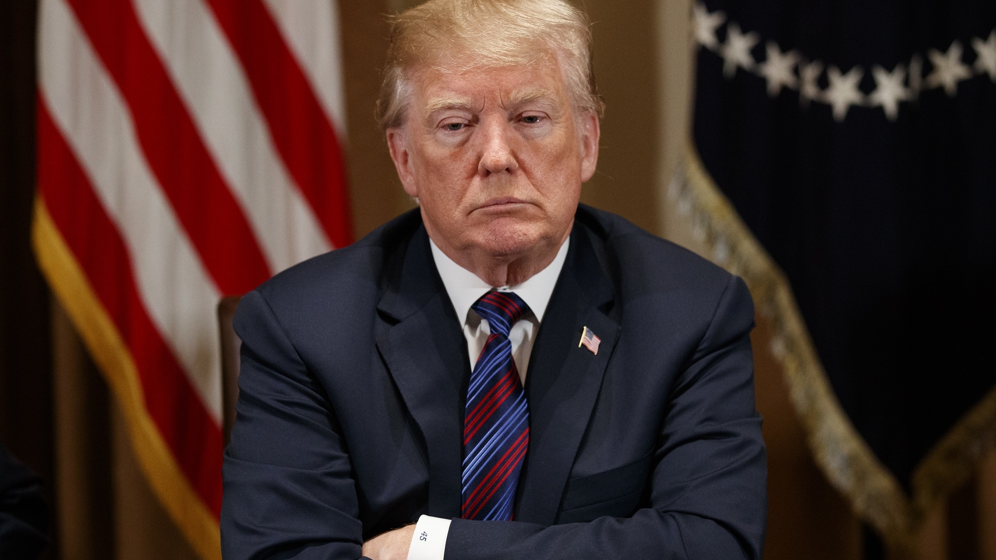 President Donald Trump listens during a meeting with governors and lawmakers in the Cabinet Room of the White House, Thursday, April 12, 2018, in Washington. (AP Photo/Evan Vucci)
