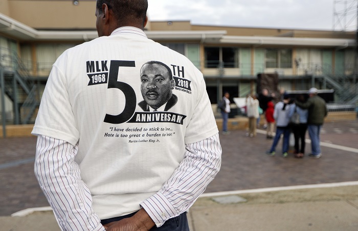 Gregory X wears a shirt commemorating the 50th anniversary of the death of Rev. Martin Luther King Jr. outside the National Civil Rights Museum, Monday, April 2, 2018, in Memphis, Tenn. The museum was formerly the Lorraine Motel, where King was assassinated April 4, 1968. (AP Photo/Mark Humphrey)