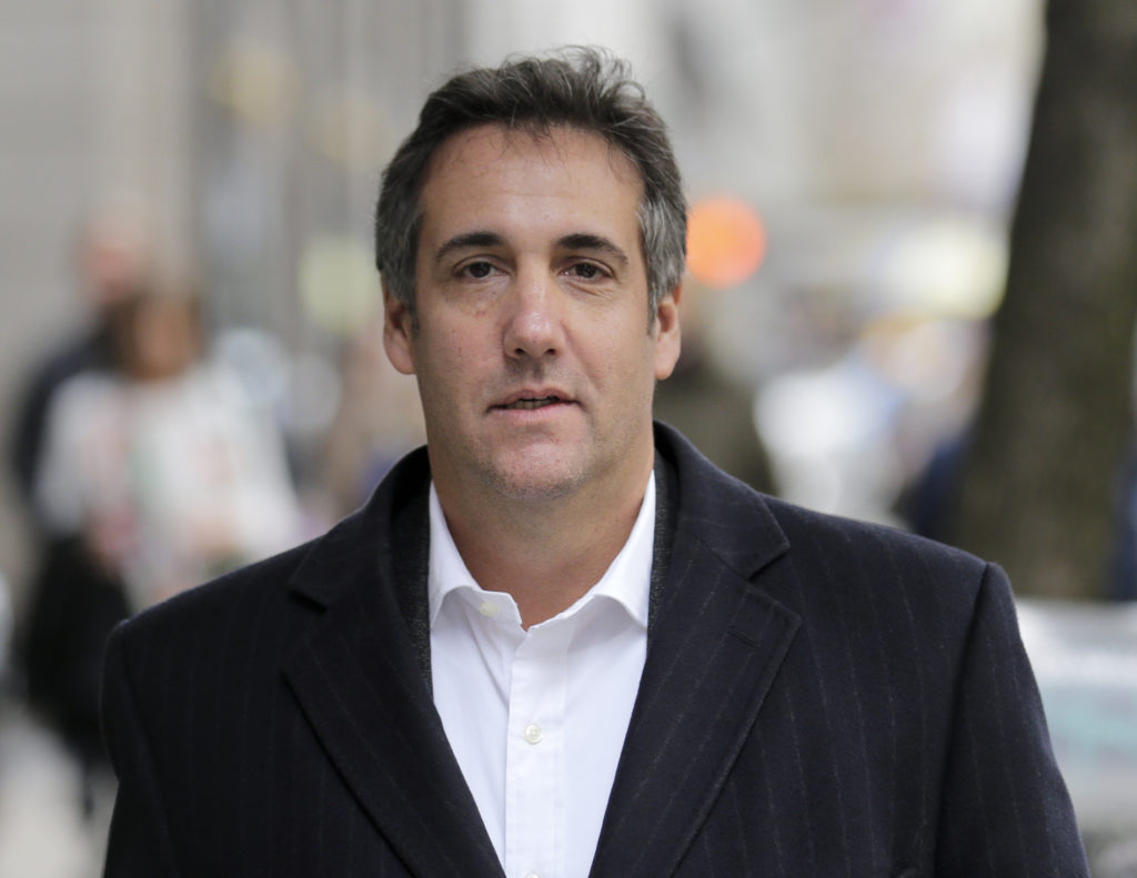 Michael Cohen, President Donald Trump's personal attorney, walks down the sidewalk in New York, Wednesday, April 11, 2018. Federal agents on Monday raided the offices of Cohen, who has been under intense public scrutiny for weeks over a $130,000 payment to a porn actress who says she had sex with Trump more than a decade ago. (AP Photo/Seth Wenig)