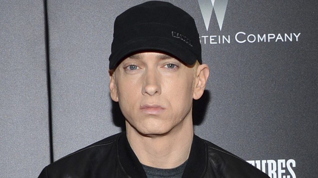 FILE - In this July 20, 2015, file photo, Rapper Eminem attends the premiere of "Southpaw" in New York. Eminem, The Killers, Muse, Future, Bassnectar and Sturgill Simpson lead the lineup for the Bonnaroo Music and Arts Festival this June in Tennessee. The festival announced on Tuesday, Jan. 9, 2018, their lineup for the music festival in Manchester, June 7 -10. (Photo by Evan Agostini/Invision/AP, File)