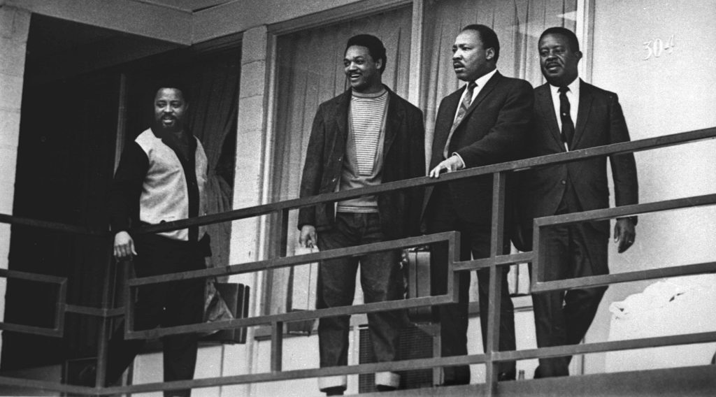 The Rev. Martin Luther King Jr. stands with other civil rights leaders on the balcony of the Lorraine Motel in Memphis, Tenn., on April 3, 1968, a day before he was assassinated at approximately the same place. From left are Hosea Williams, Jesse Jackson, King, and Ralph Abernathy. The 39-year-old Nobel Laureate was the proponent of non-violence in the 1960's American civil rights movement. King is honored with a national U.S. holiday celebrated in January. (AP Photo/Charles Kelly)