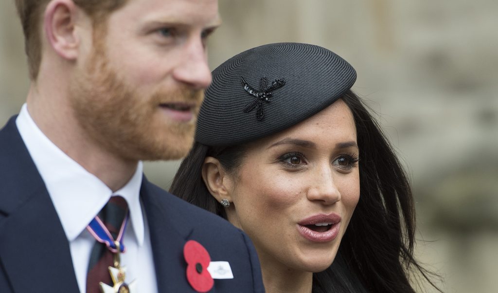 Britain's Prince Harry and Meghan Markle attend a Service of Thanksgiving and Commemoration on ANZAC Day at Westminster Abbey in London, Wednesday, April 25, 2018. (Eddie Mulholland/Pool via AP)