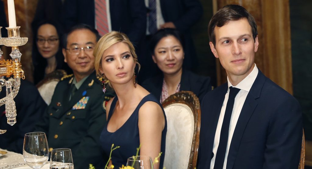 FILE - In this Thursday, April 6, 2017, file photo, Ivanka Trump, center, daughter and assistant to U.S President Donald Trump, is seated with her husband, White House senior adviser Jared Kushner, right, during a dinner with President Donald Trump and Chinese President Xi Jinping, at Mar-a-Lago, in Palm Beach, Fla. China has granted provisional approval for four additional Ivanka Trump trademarks since April 20, and her brand has continued to seek more intellectual property protection in China, with at least 14 applications filed around the time she took on an official White House role, Chinese public records show. (AP Photo/Alex Brandon, File)